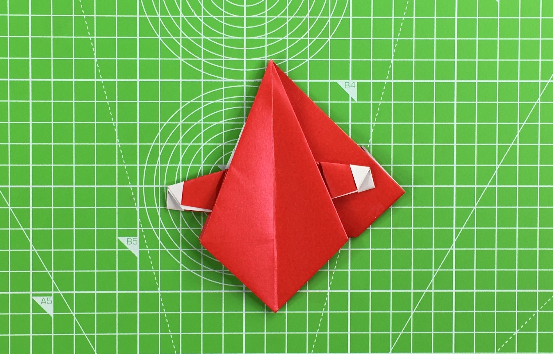 Origami Santa tutorial - how to make an origami Santa, step 39