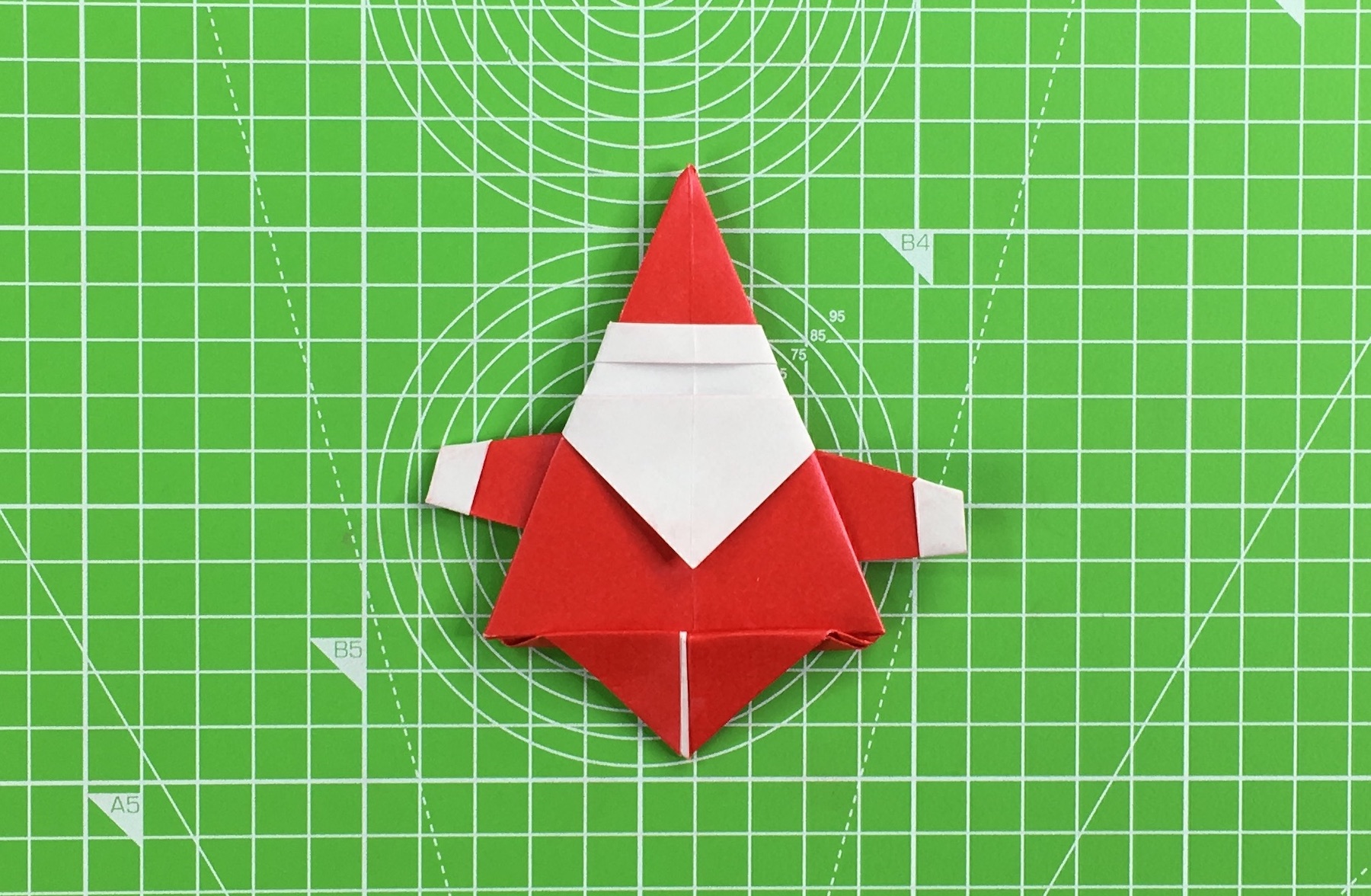 Origami Santa tutorial - how to make an origami Santa, step 44