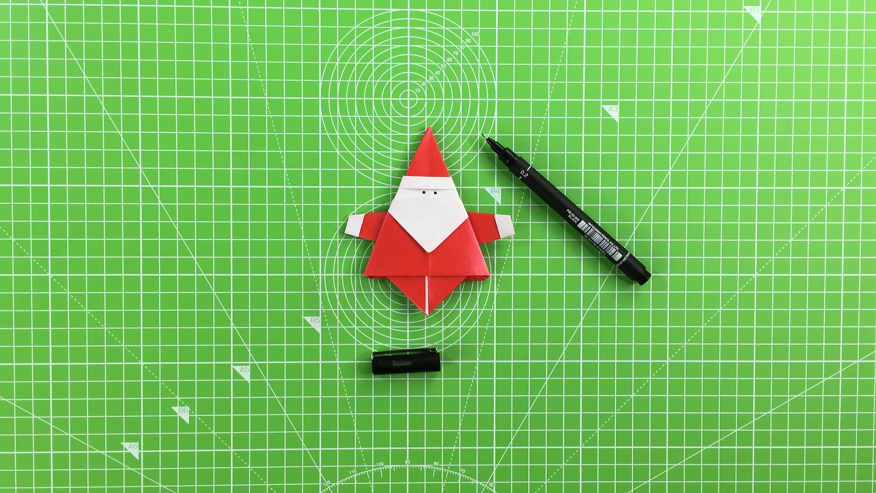 Origami Santa tutorial - how to make an origami Santa, step 46