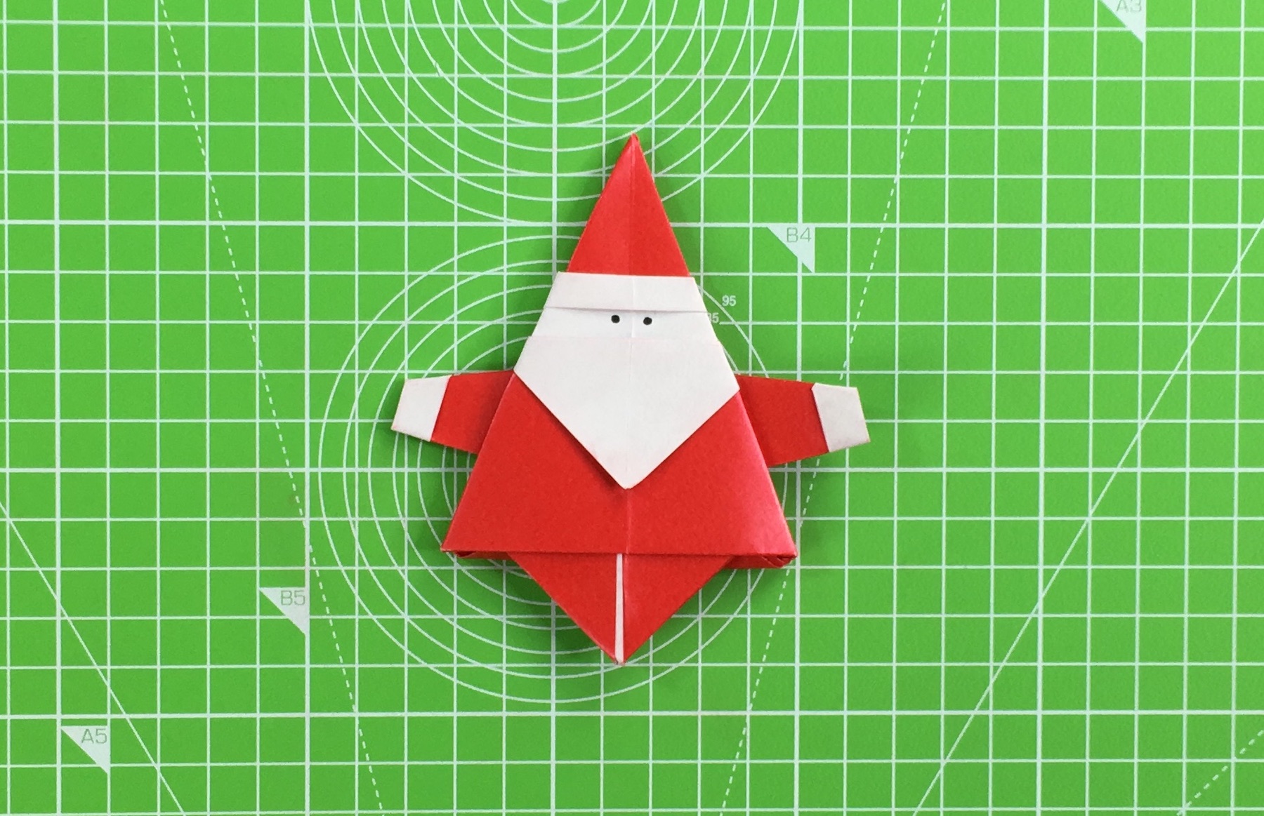 Origami Santa tutorial - how to make an origami Santa, step 47