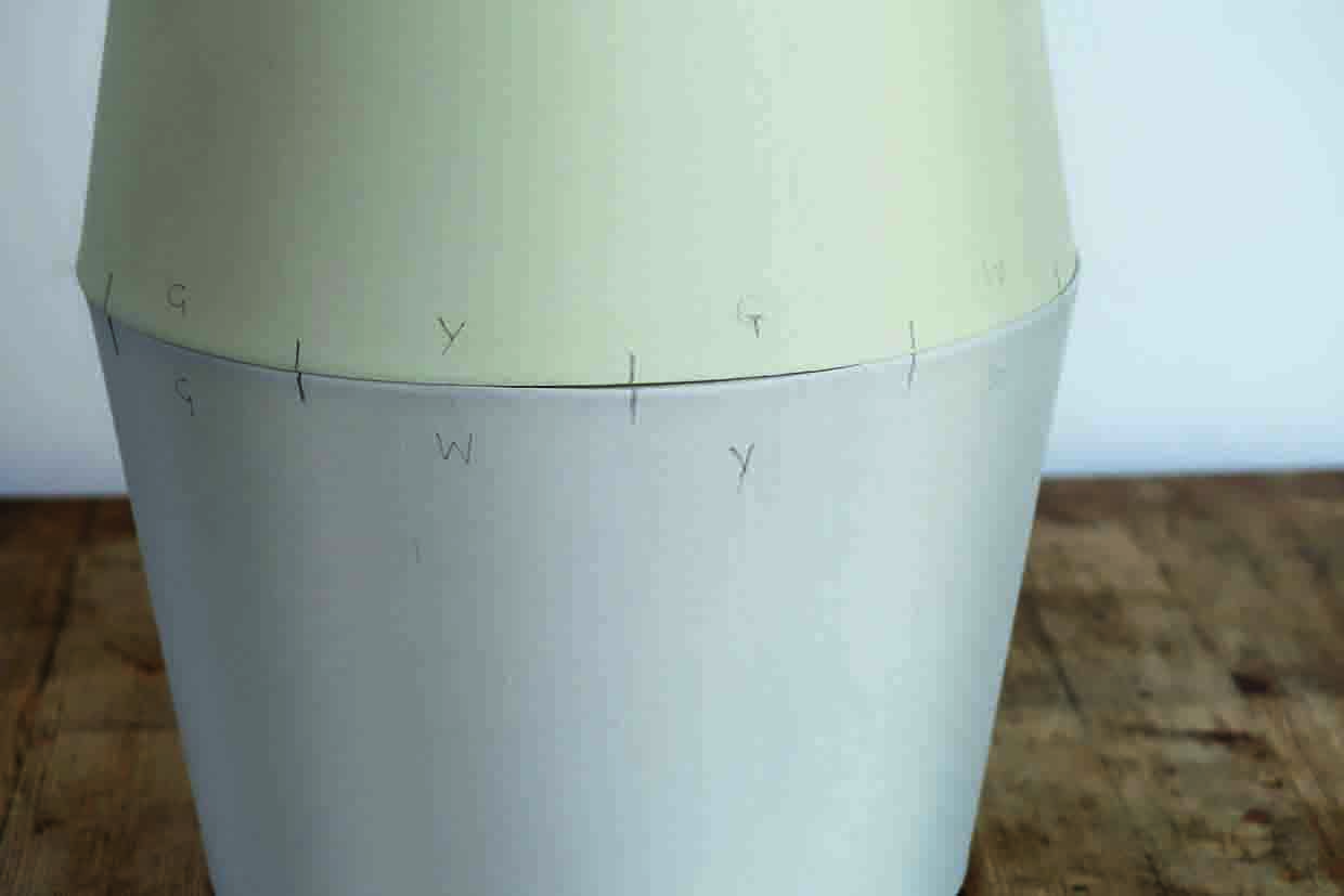 the detail of the pencil marks on the 2 lampshades is shoed