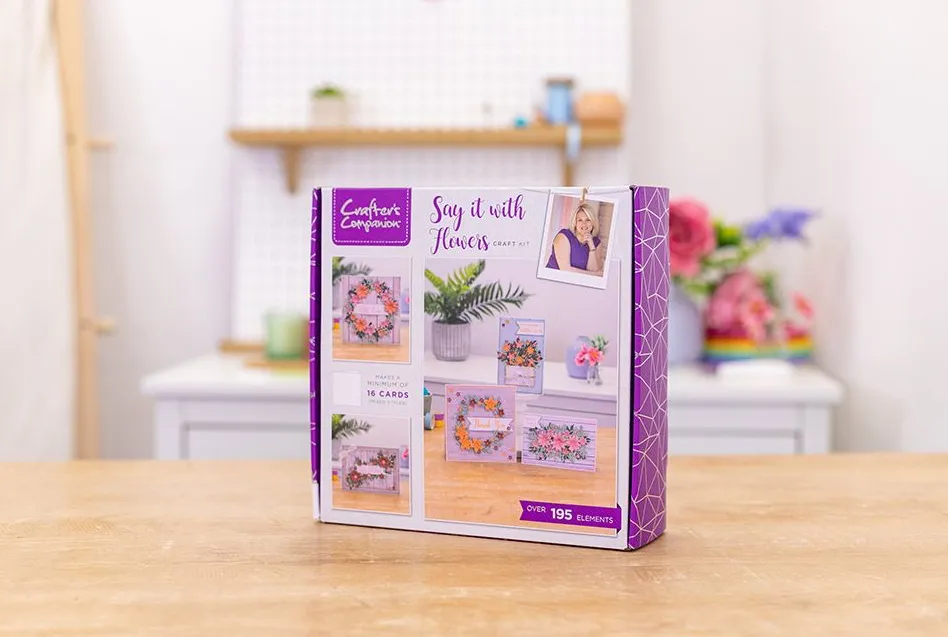 The front of the card making pic has a picture of Sara Davies along with photos of five of the cards you can make in shades off peach, pink, lilac and green