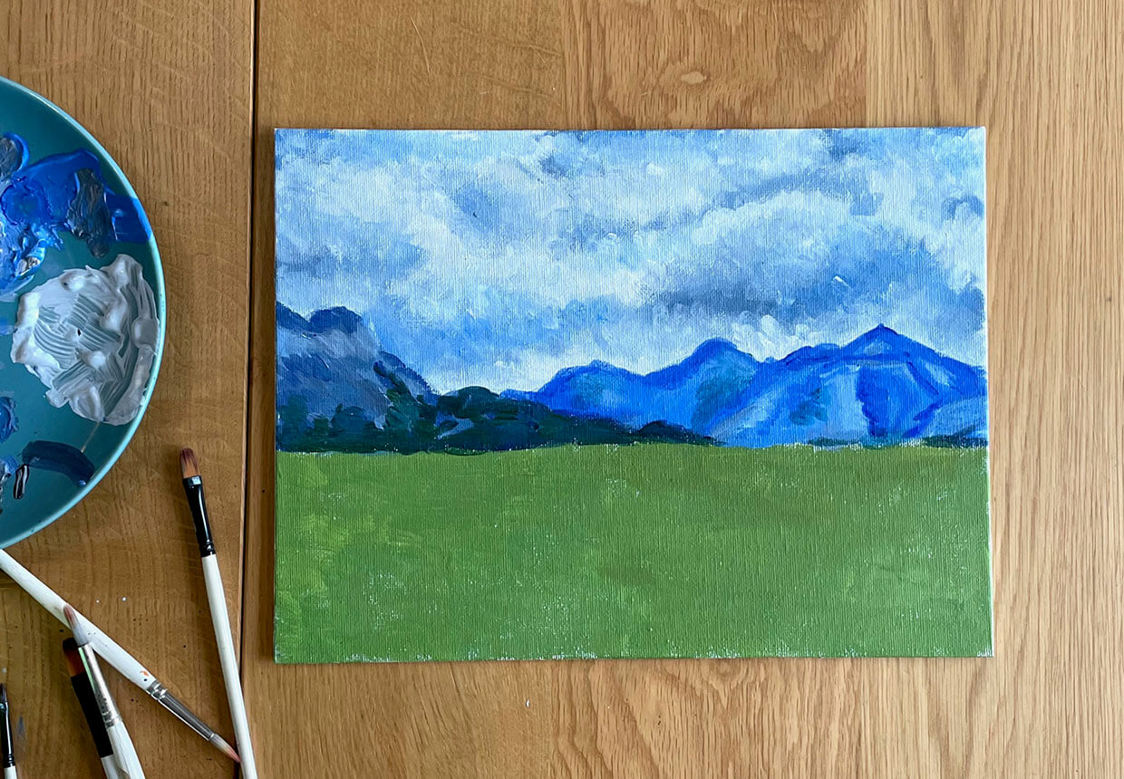 Acrylic landscape painting step six – painting the mountains