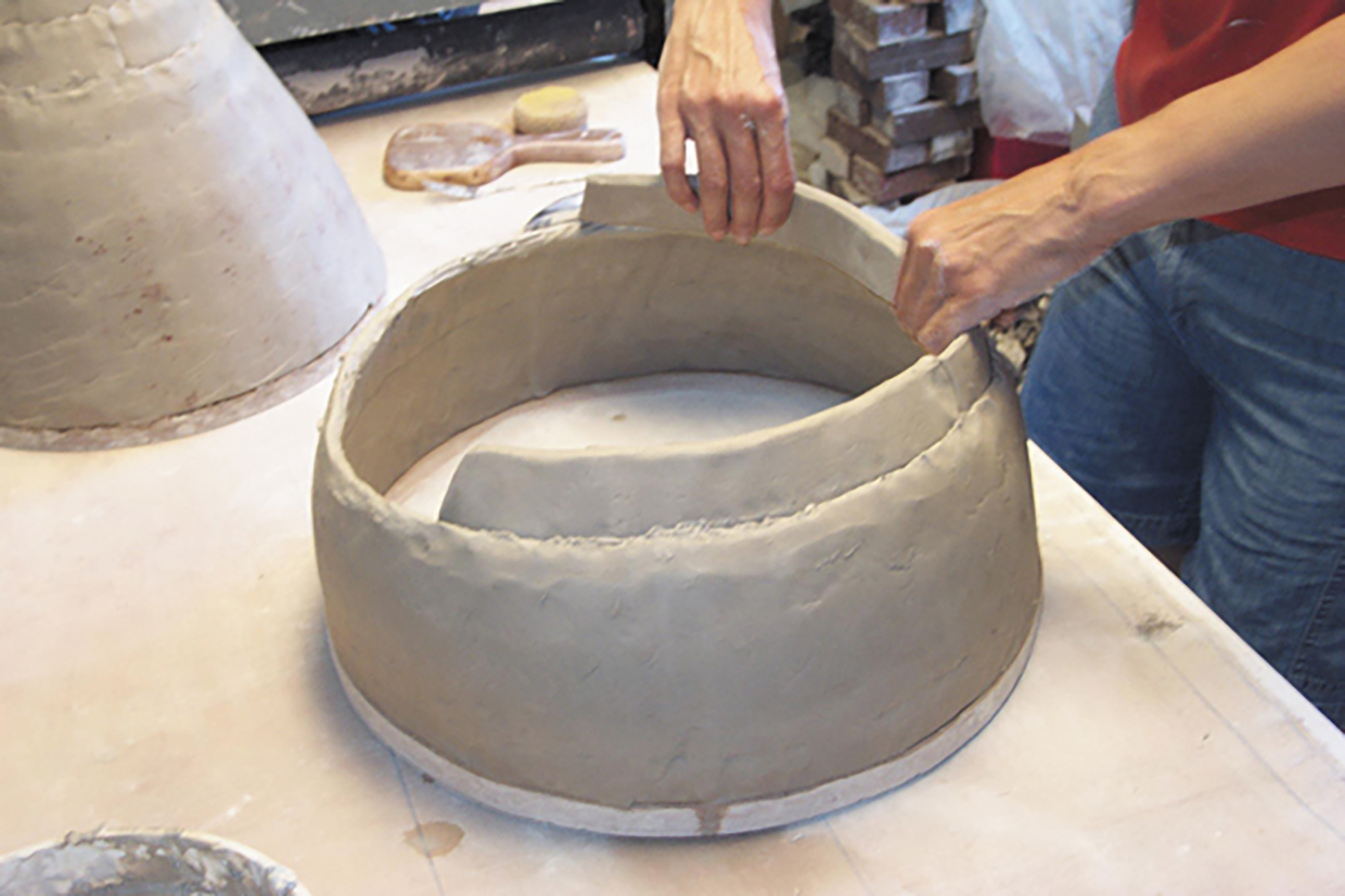 Flat coil pottery construction