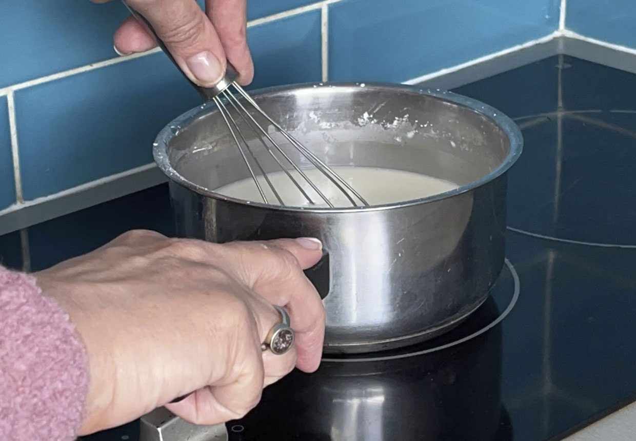 heating the air dry clay mixture in a saucepan