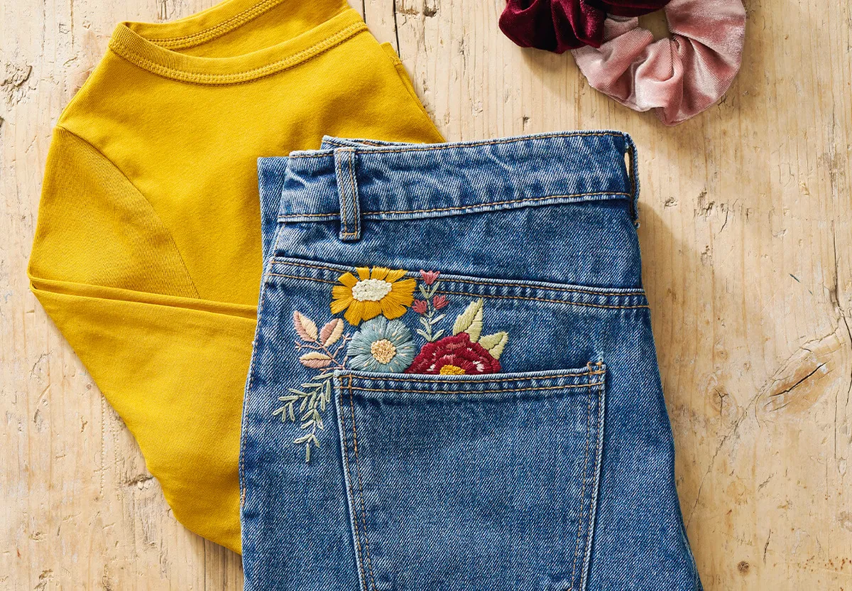 How to embroider jeans with a vintage floral design - Gathered