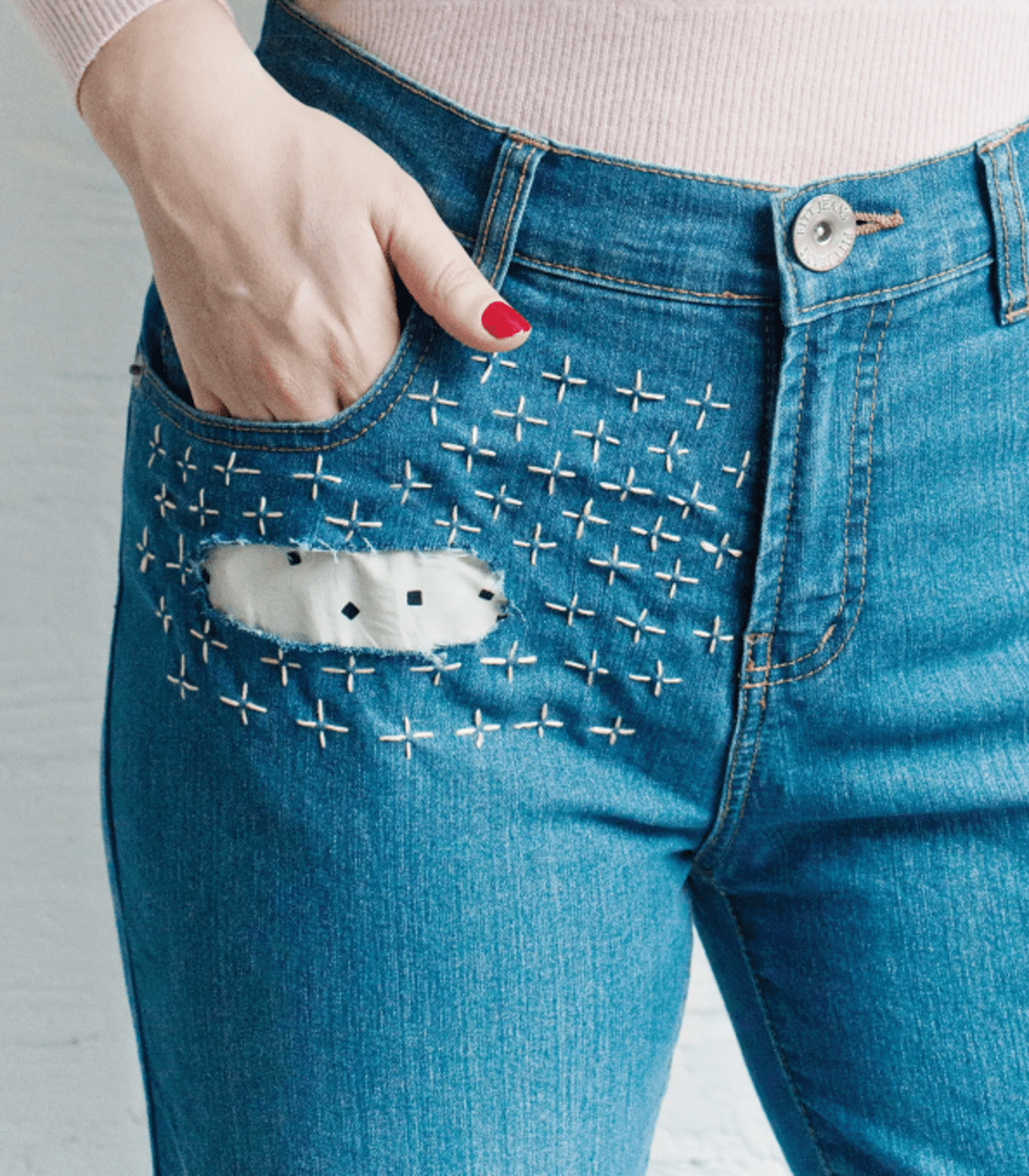 Jeans with sashiko embroidery