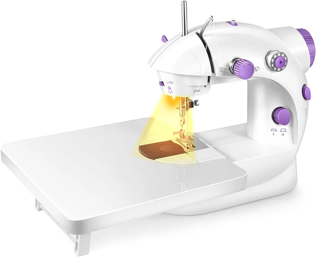 Sewing machine with folding extension table