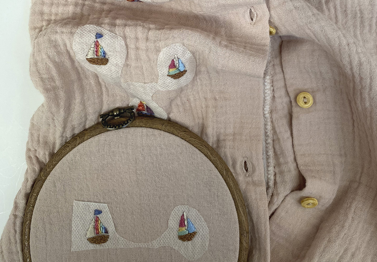 embroidered romper – repeat designs