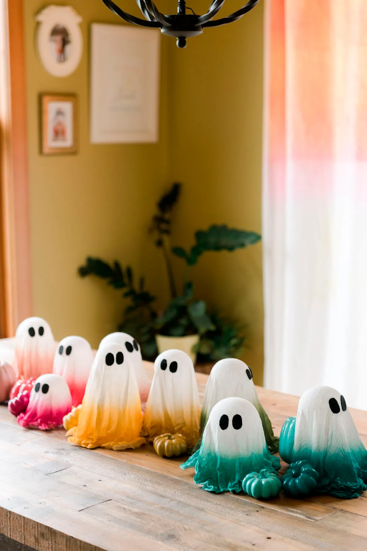 Colourful cheesecloth ghosts