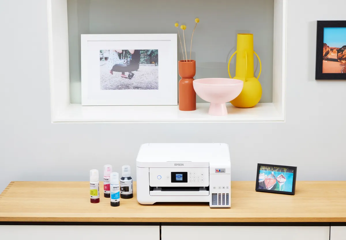SIZED - Article - Epson EcoTank on a shelf with 4 ink bottles HOME OFFICE - September 2023 (1)