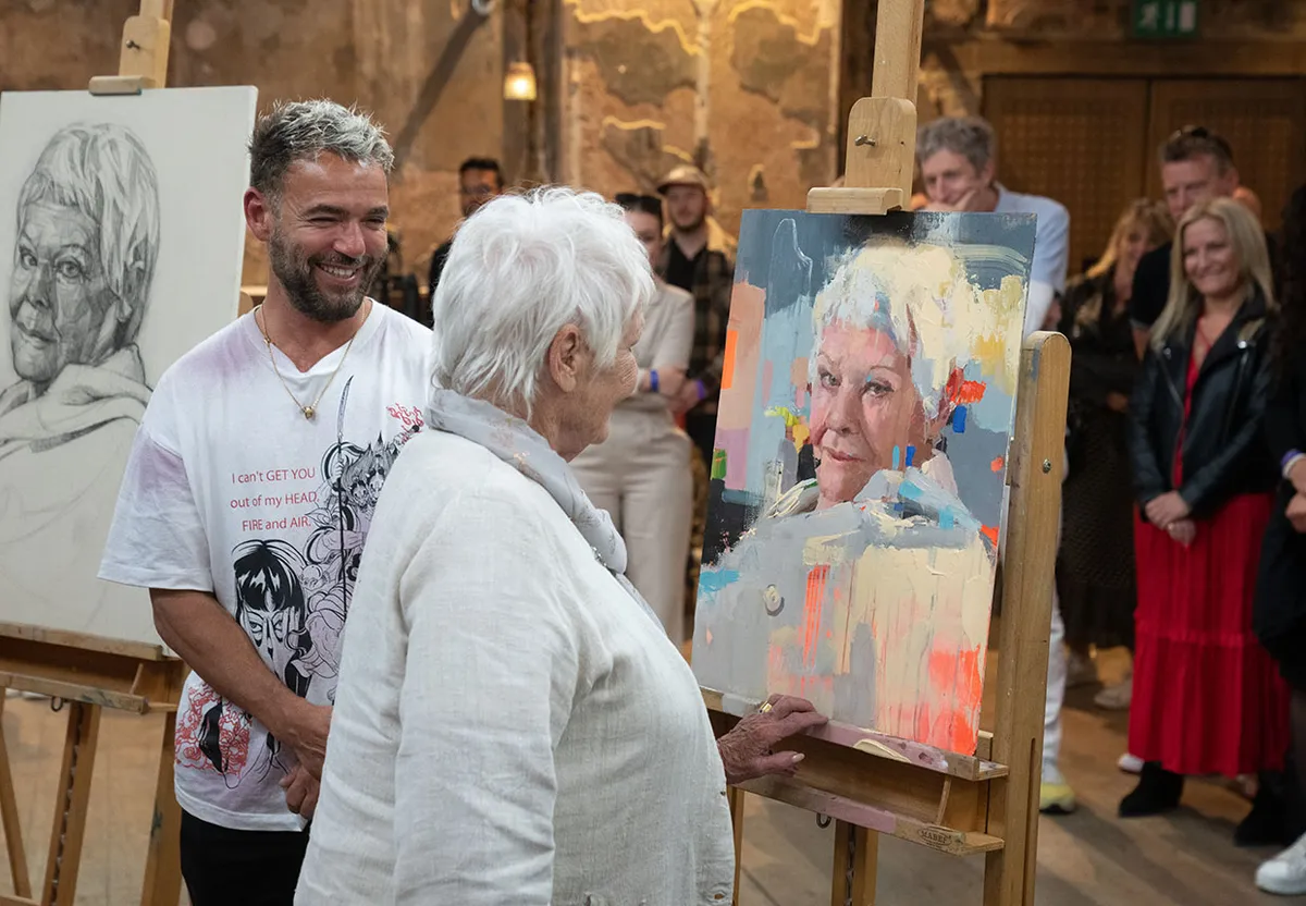 Judi Dench looks at portraits of herself on Portrait Artist of the Decade