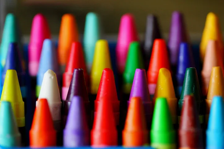 Box of colourful crayons
