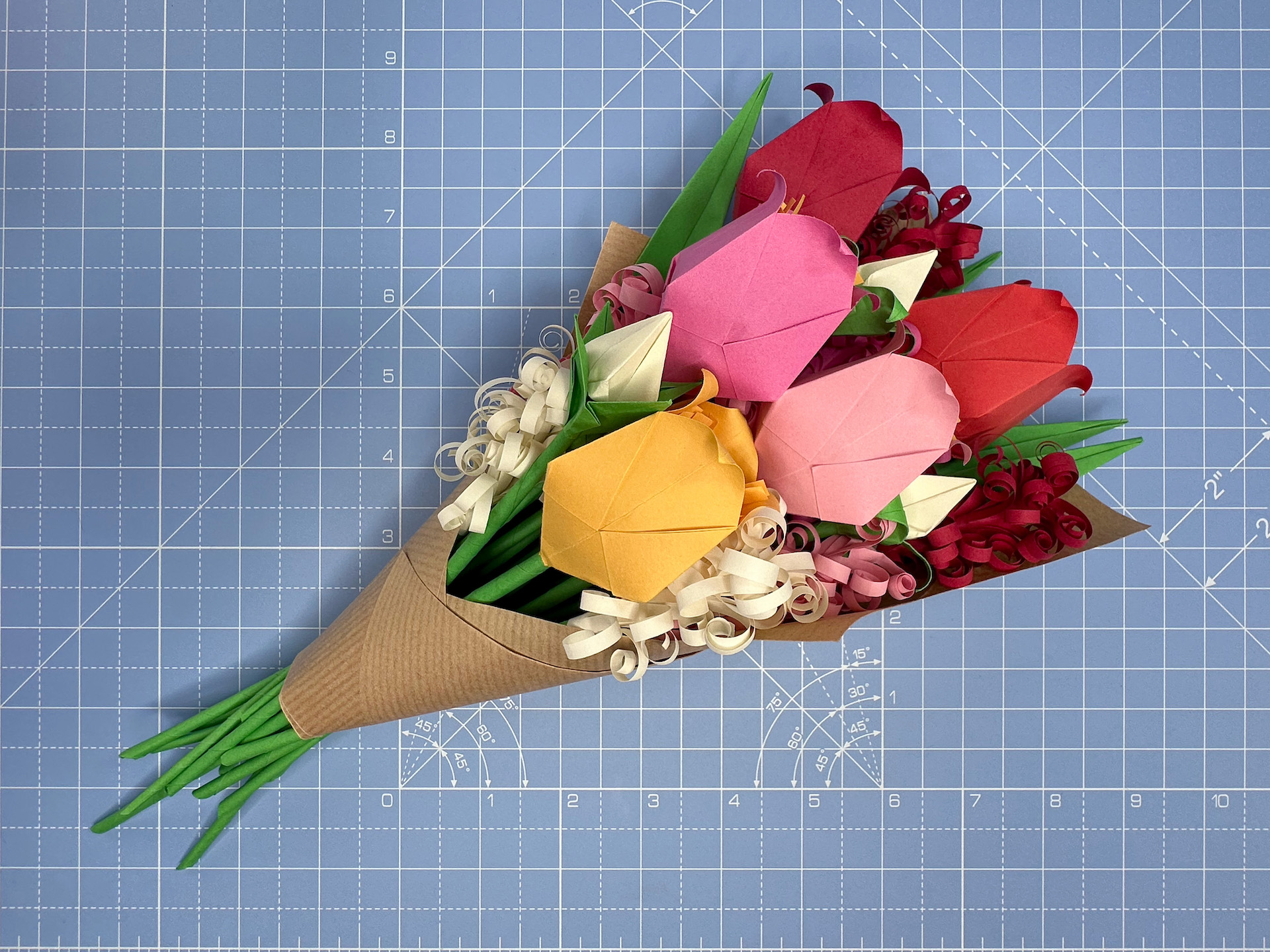Flower arranging an origami bouquet step 57