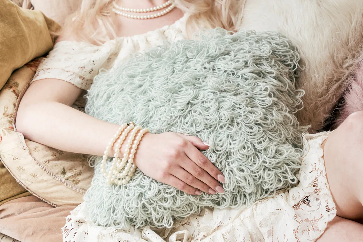 Crochet coquette-core loopy cushion