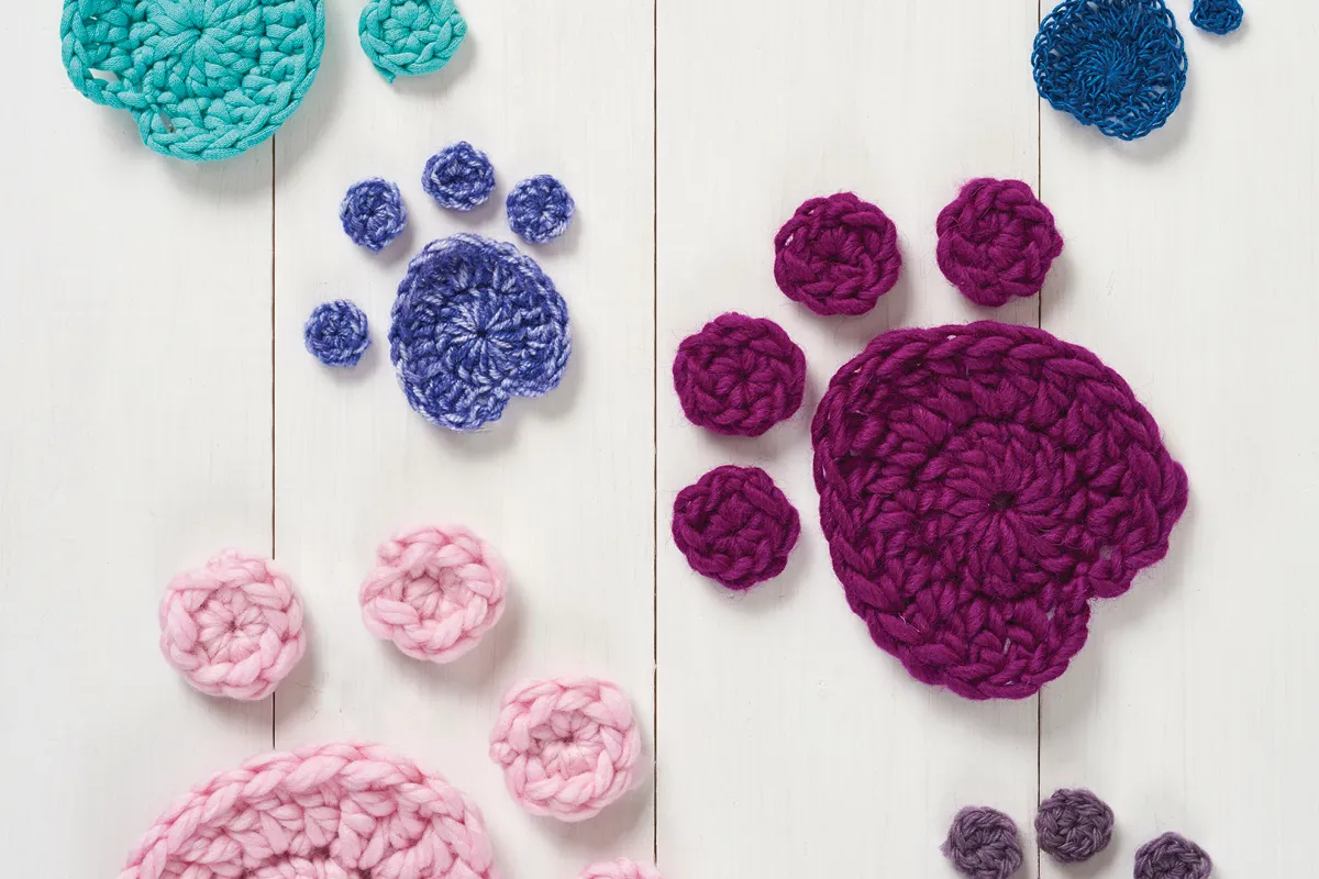 Crochet paw print motifs