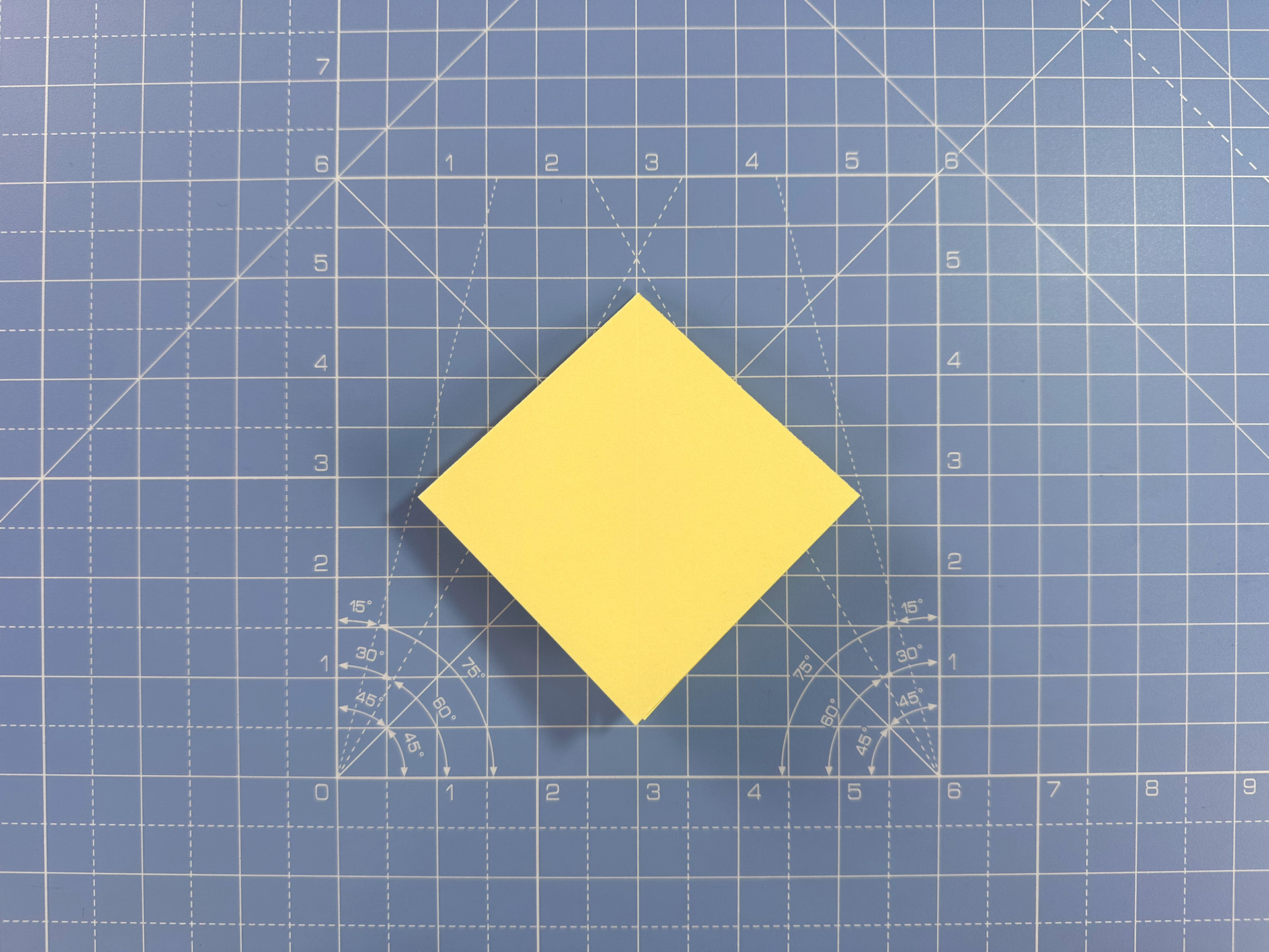 Making an origami flower bud step 14b