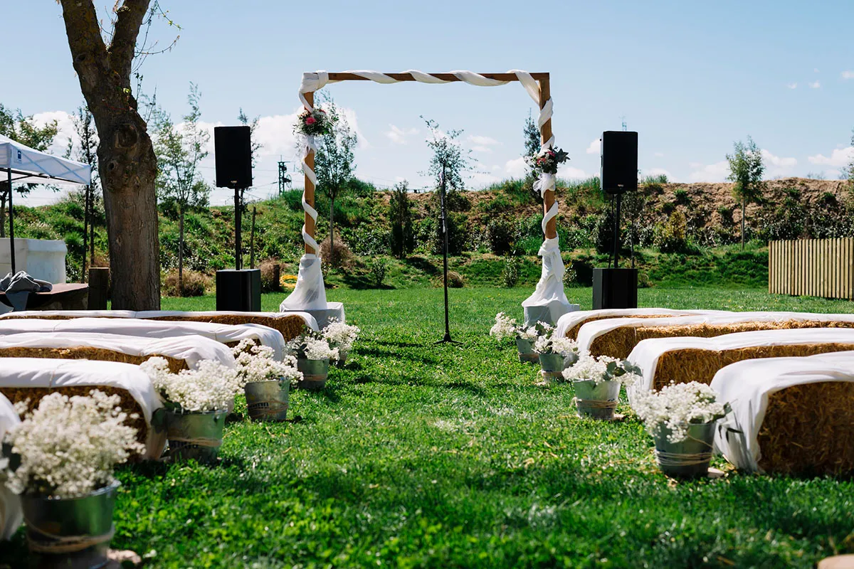 Hay bale seating at a wedding