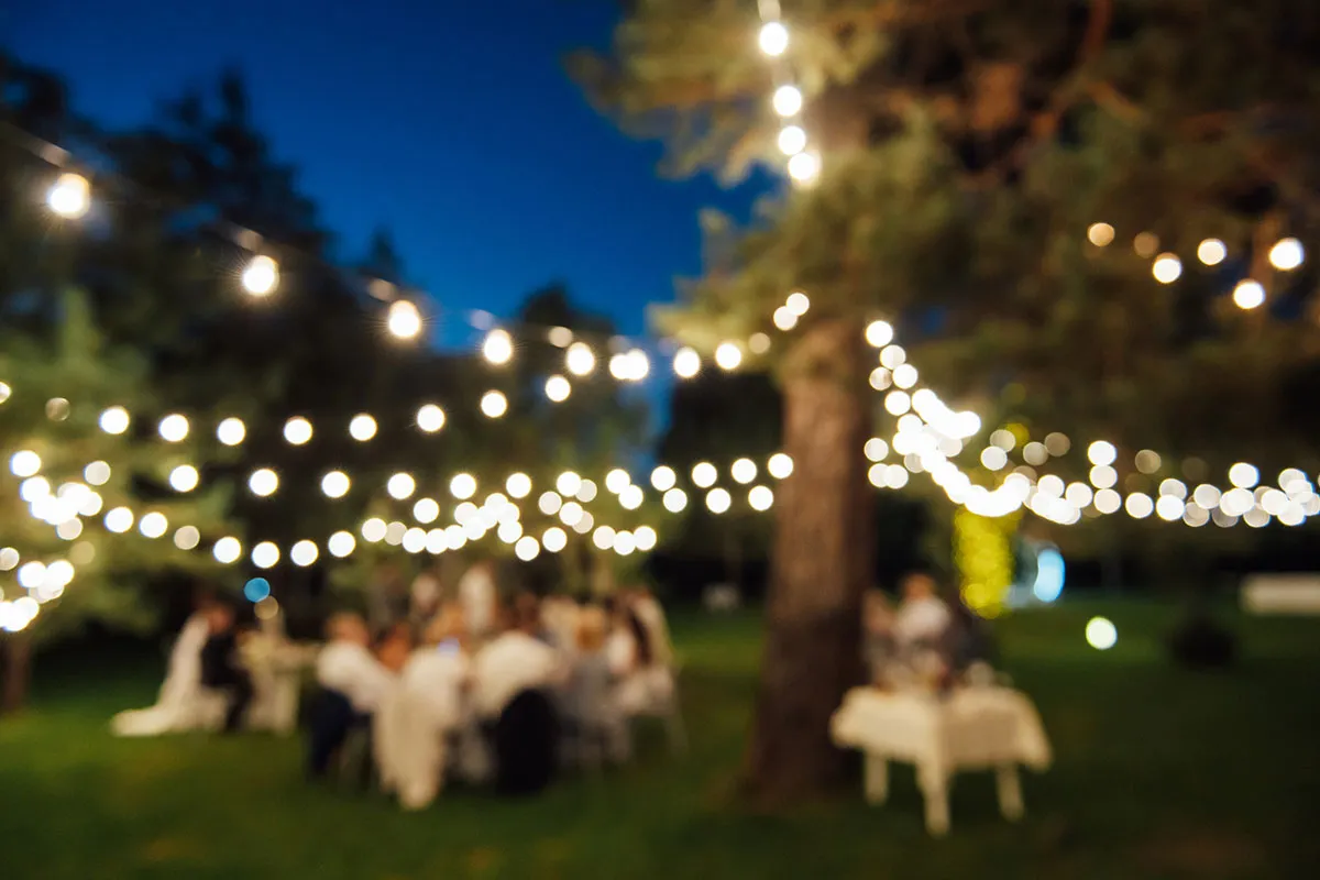 Blurred image of outdoor lighting at a wedding