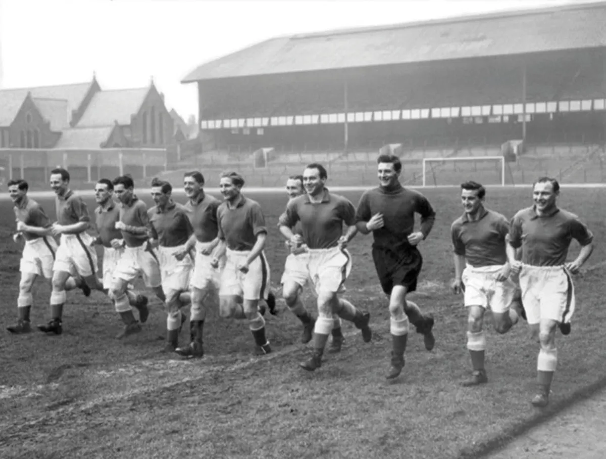 Everton train at Goodison Park in preparation for an FA Cup tie against Liverpool on 29 January 1955. George Rankin is second from the right