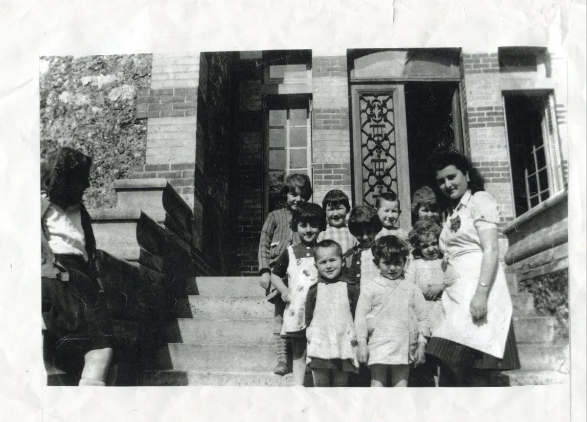 Denise Holstein (far right) at the home in Louveciennes with her 9 charges shortly before they were deported. In the middle of the back row are Annette (2nd from left) and Paulette to her right