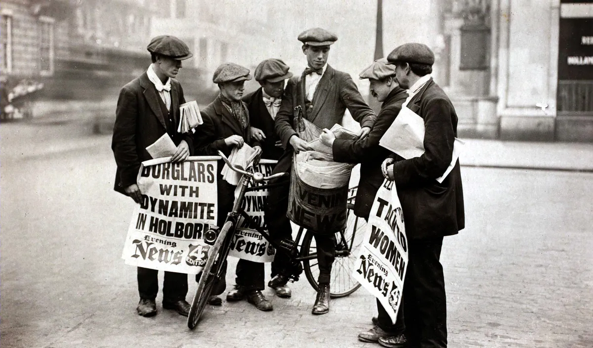 Newspaper boys with old newspapers, London, c.1910
