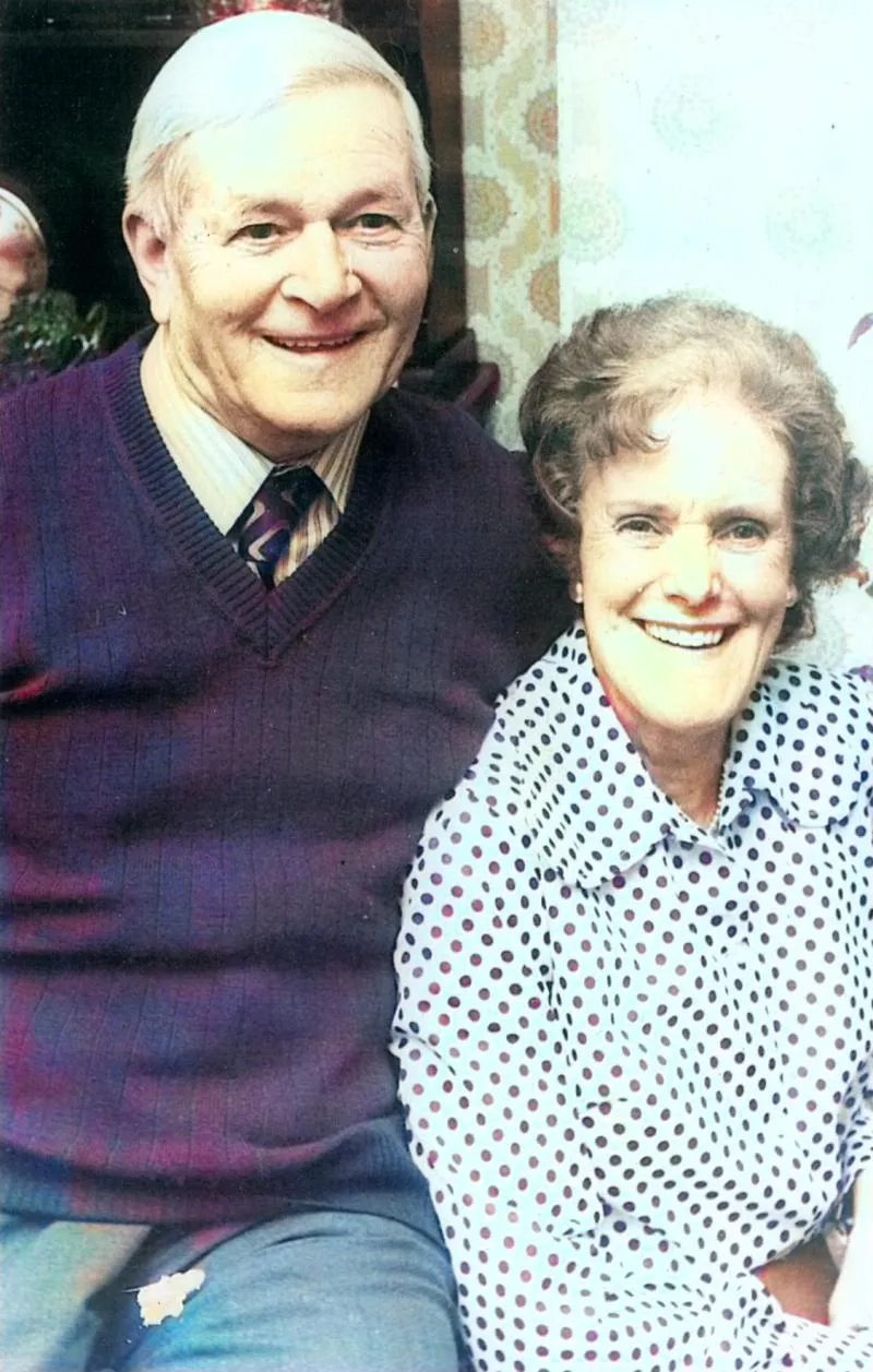 Colourised photograph of elderly couple