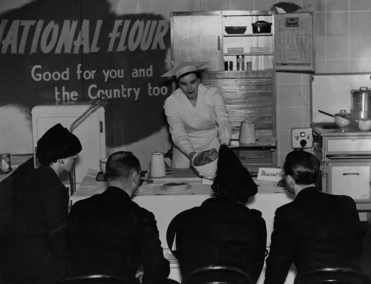 A baker demonstrates how to make the National Loaf, 1942 rationing