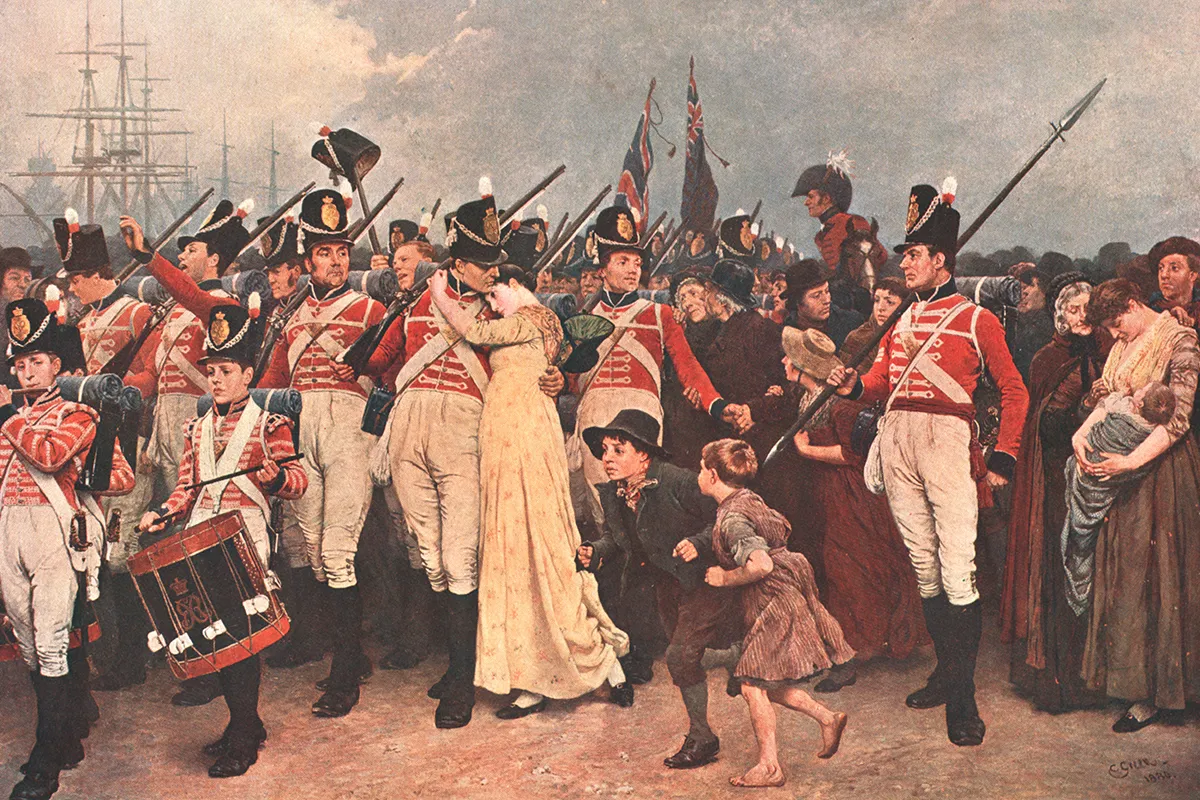 A 19th century painting of a procession of soldiers returning from the Napoleonic Wars, wearing red jackets and tall black hats and carrying British flags, and led by a drummer boy