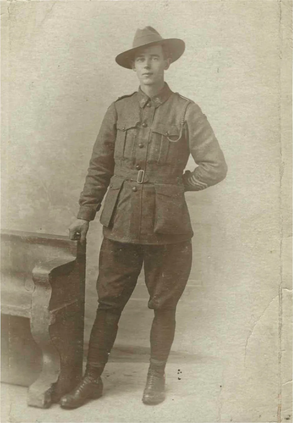 Black and white photograph of a young man in Australian army uniform with a broad-brimmed hat