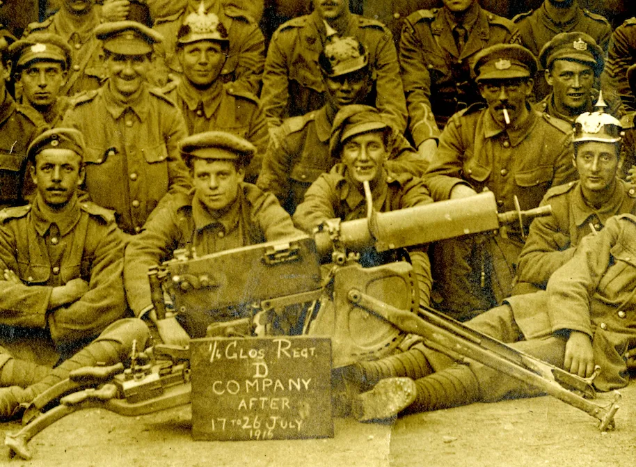 First World War Gloucestershire soldiers including a black soldier behind a stolen German Maxim gun