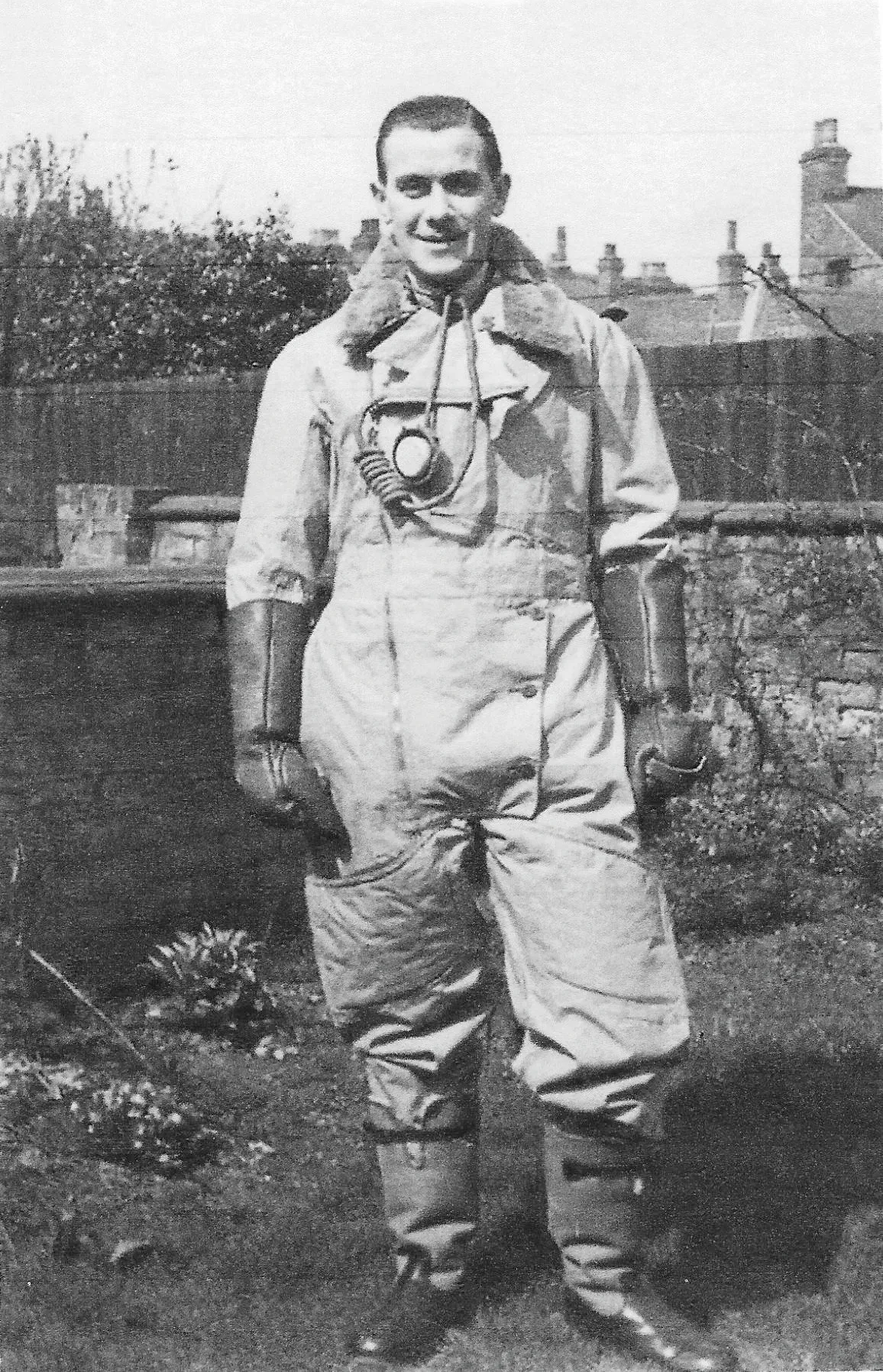 Black and white photograph of a man in Second World War flight gear