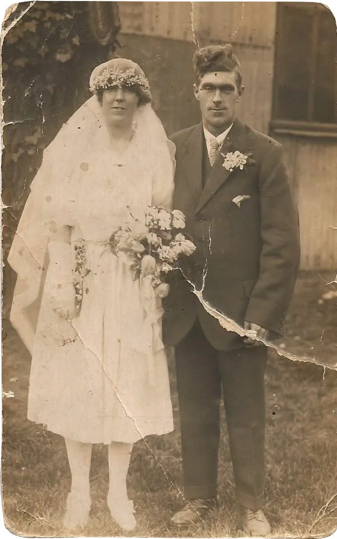 Black and white photograph of a couple getting married