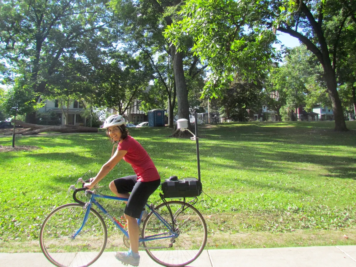 For her research, Carly Ziter biked around Madison with a small weather station strapped to the back of her bike. © Carly Ziter