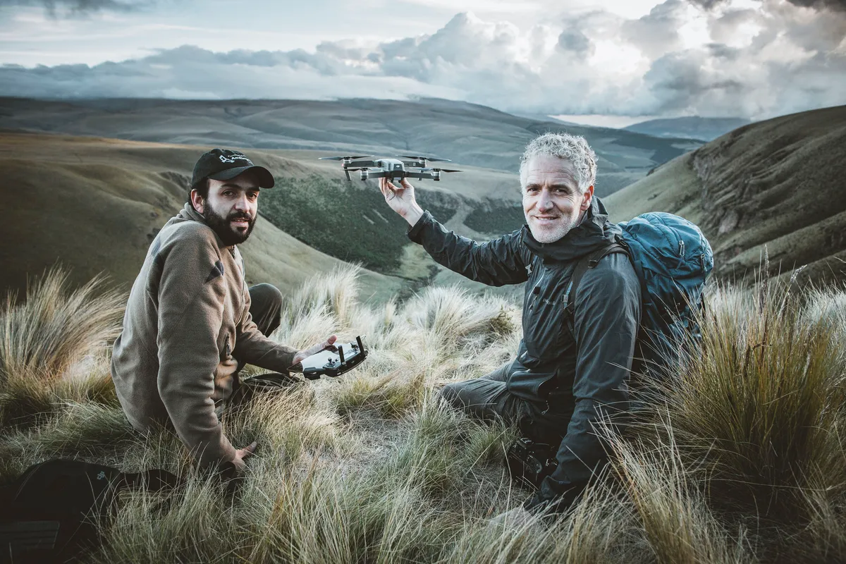 Gordon Buchanan with Sebastian Kohn in the Antisanilla Reserve, in the Andes, whilst using a drone to observe Andean Condors. © Freddie Claire