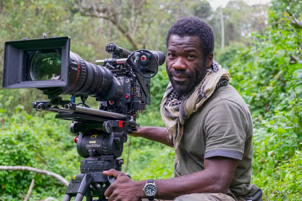Vianet Djenguet filming in the Bwindi Impenetrable National Park, Uganda. © Dominic Weston