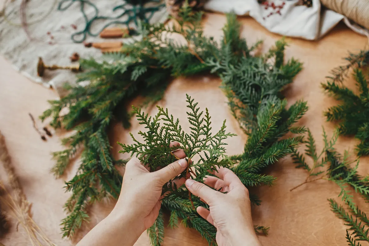 Make your own natural Christmas wreath. Bogdan Kurylo/Getty
