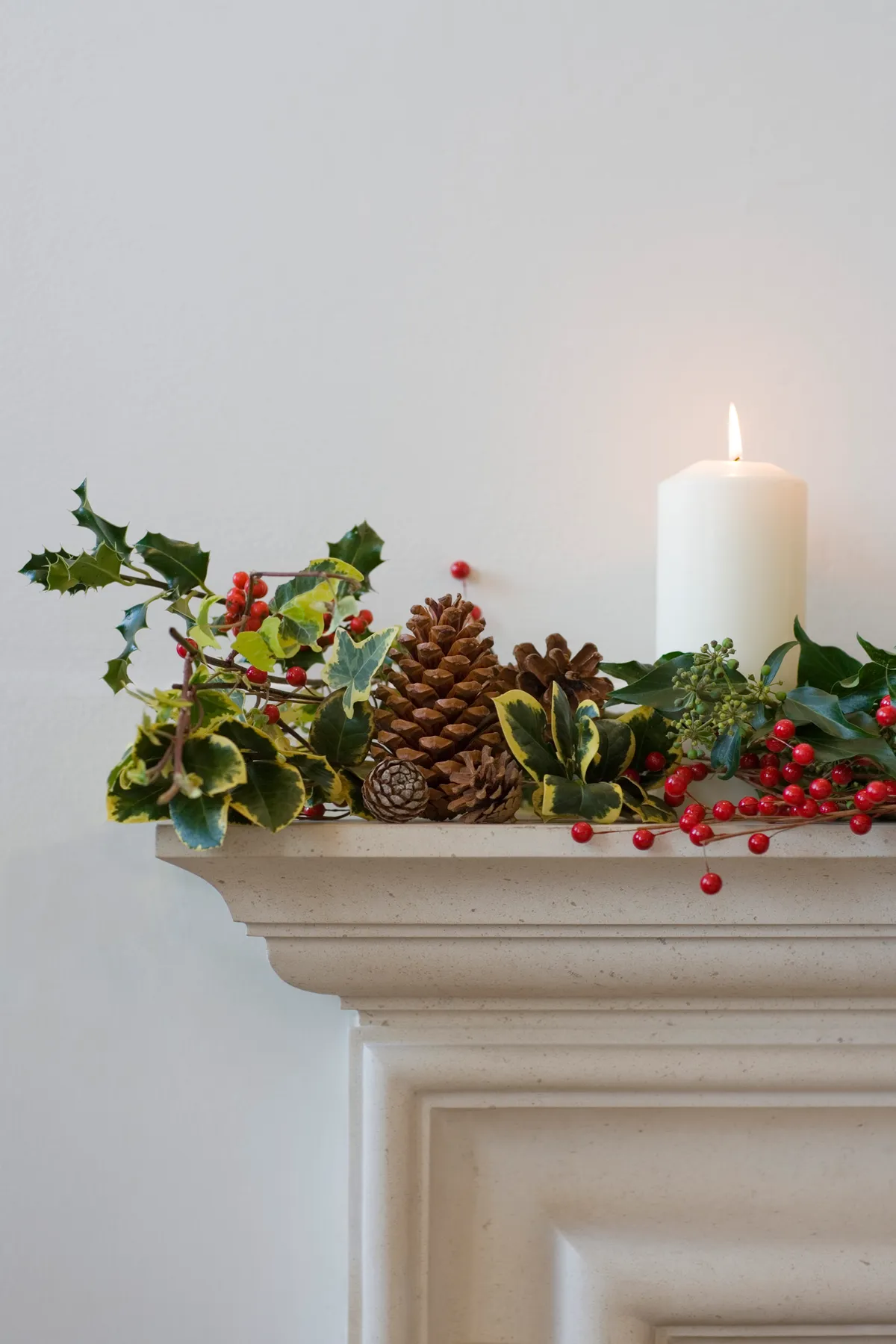 Use natural materials to decorate rather than tinsel and other plastics. Polka Dot Images/Getty