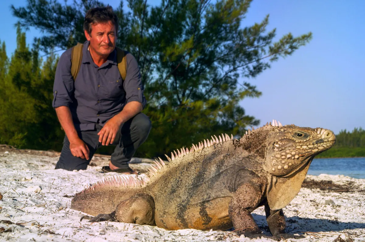 Colin Stafford-Jones and an iguana.