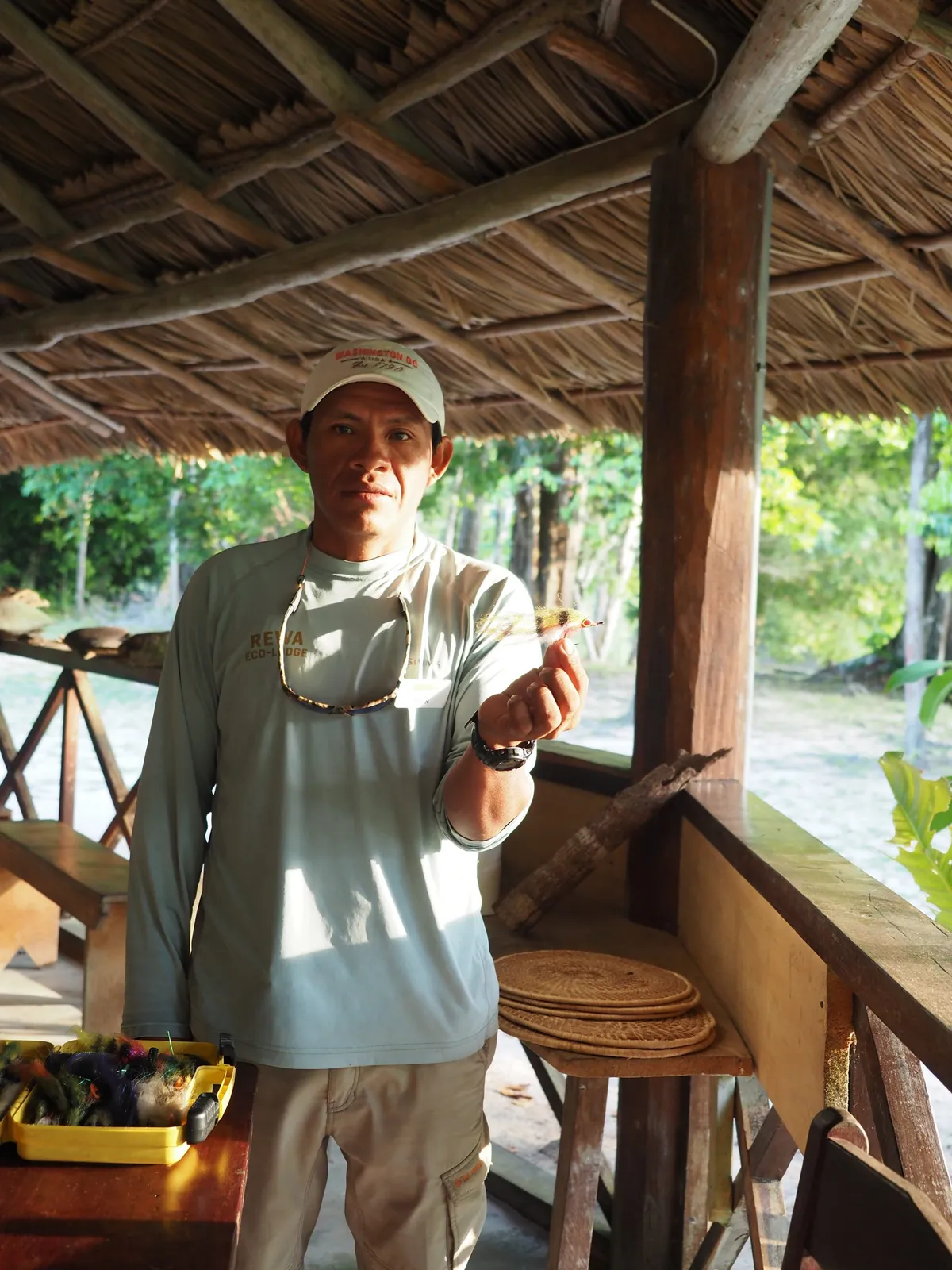 Rovin Alvin, a guide at Rewa Eco Lodge, shows the bait they use for catch-and-release fly fishing for arapaima. © Megan Shersby