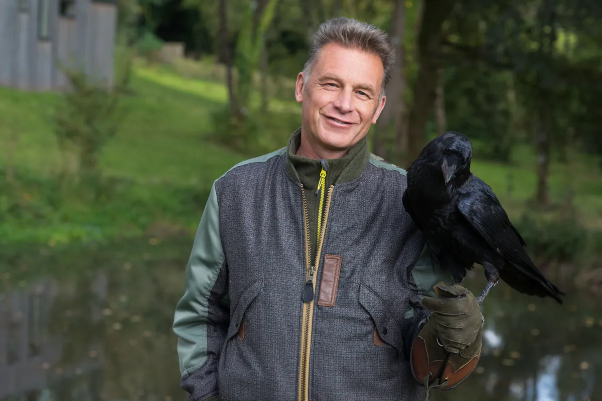 Chris Packham with Bran the Raven. © Lucy Bowden/BBC
