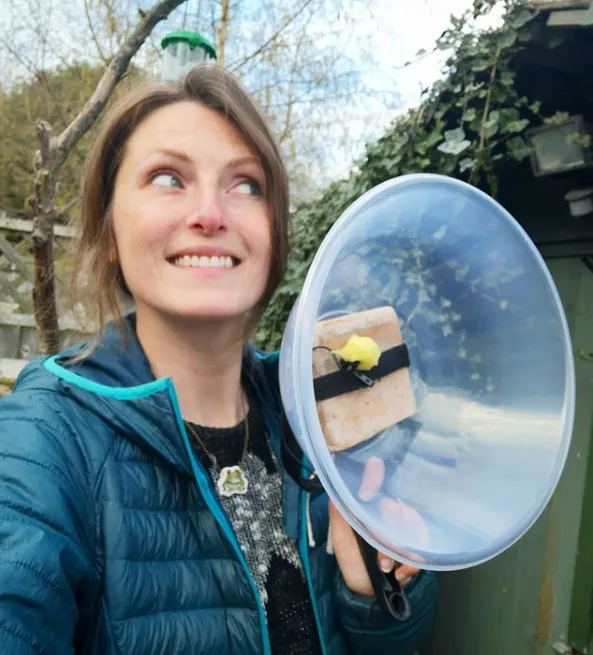Lucy Hodson with a parabolic made using a mixing bowl.