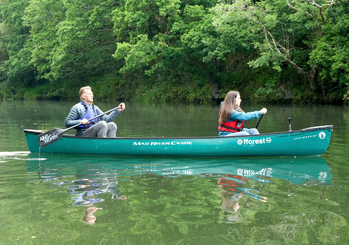 Chris Packham and Megan McCubbin canoeing on the River Teifi. © Jack Tunnicliffe/BBC
