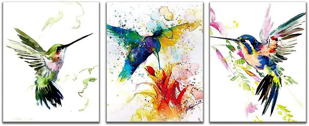 Three vibrant hummingbirds depicted by watercolour