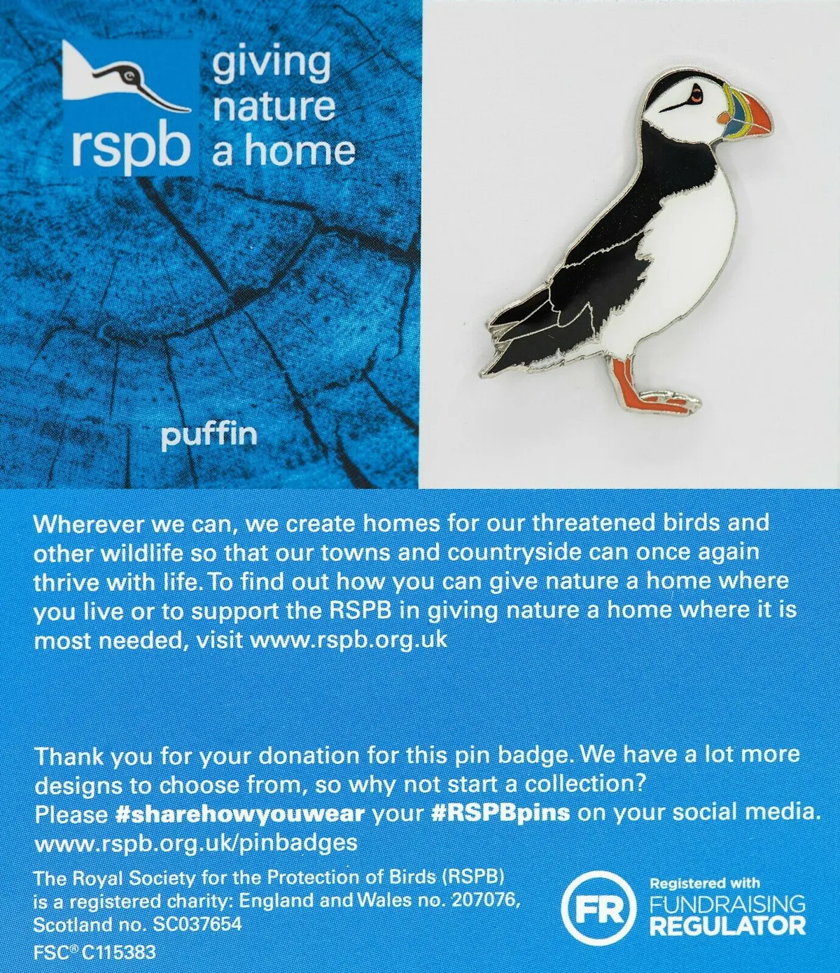 An enamel pin of a puffin, attached to a card with information about the RSPB.